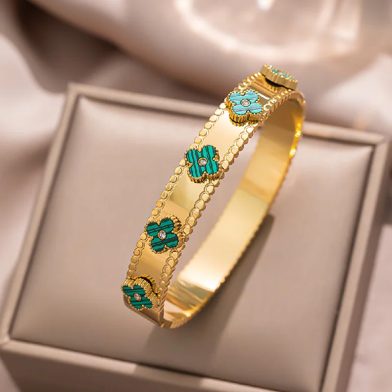 190 gold green diamond studded bracelet