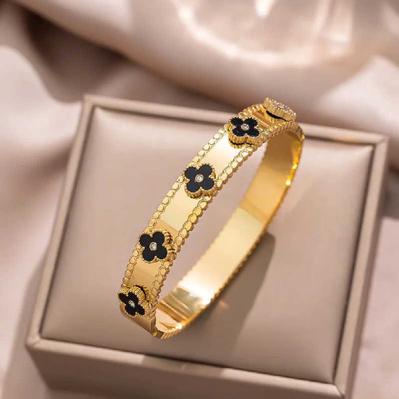 190 gold black diamond studded bracelet