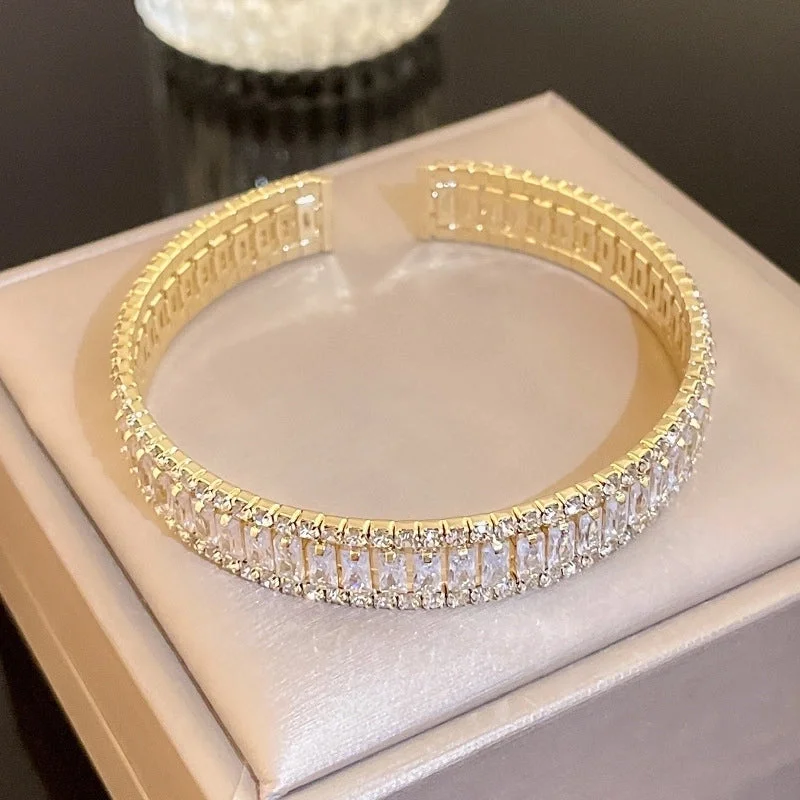 19 Open-Ended Bracelet-Gold Crystal with Diamonds.