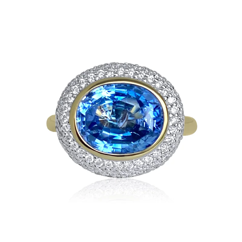 women’s luxury rings-Lotus East West Ceylon Blue Sapphire Oval Solitaire & Emerald Petals Ring